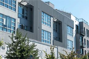 Portland apartment for rent - A modern building with a lot of windows and balconies.