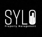 Portland apartment for rent - a management logo lit up in the dark