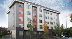 Portland apartment for rent - an apartment building on the side of a street
