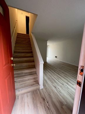 Portland townhouse for rent - a view of the stairs from the living room