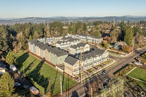 Oregon City townhouse for rent - Aerial view of townhome community with surrounding trees at Holmes Park Townhomes Apartments, Oregon City, OR 97045