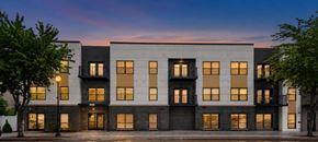 Oshkosh townhouse for rent - A modern building with a facade.