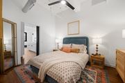 St. Louis apartment for rent - a bedroom with a bed and two night stands