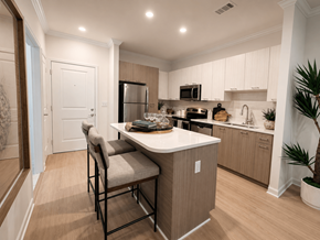 Atlanta apartment for rent - A kitchen with a table and chairs in the middle of the room.