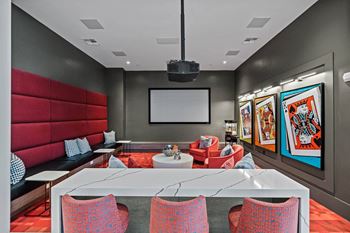 A conference room with a table and chairs