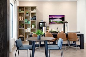 Lawrenceville apartment for rent - a room with a table and chairs