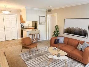 Lafayette apartment for rent - A living room with a brown couch, a brown chair, and a coffee table.