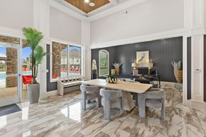 Tallahassee apartment for rent - a dining room with a table and chairs