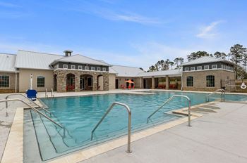 Resort-style saltwater swimming pool with sundeck