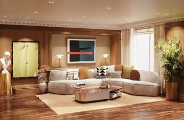 St. Louis apartment for rent - A living room with a grey sofa, a coffee table, and a painting on the wall.