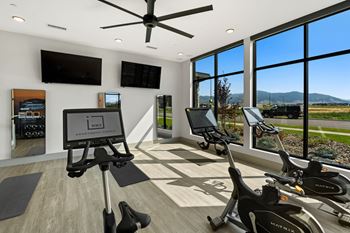Interactive fitness room for yoga, barre & spin