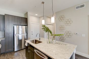 Elegant granite countertops in kitchen and baths