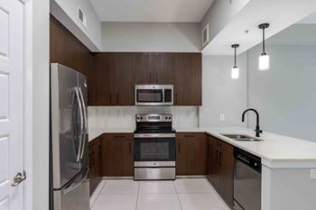 Gourmet kitchens featuring stainless appliances