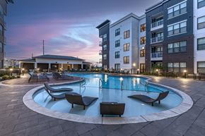 Antioch apartment for rent - an apartment swimming pool with chairs at dusk