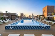 St. Louis apartment for rent - a rooftop pool with a city skyline in the background