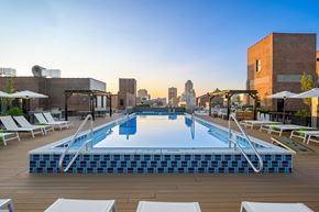 St. Louis apartment for rent - a rooftop pool with a city skyline in the background
