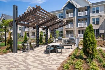 Picnic table seating and charcoal grills