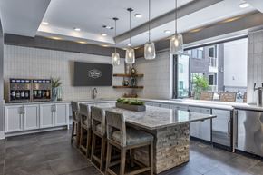 Antioch apartment for rent - a kitchen with a large island with chairs and a counter top