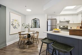Atlanta apartment for rent - A kitchen with a dining table and chairs.