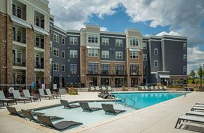 Antioch apartment for rent - A large swimming pool in front of apartment buildings.