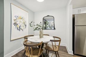 Atlanta apartment for rent - A dining room with a white table and chairs.