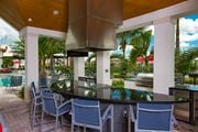 Miami apartment for rent - a view of the outdoor kitchen and pool area at the resort at longboat key club at Altis Kendall Square, Miami, 33196