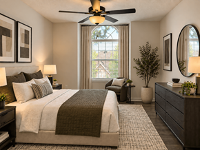Atlanta apartment for rent - A bedroom with a large bed and a ceiling fan.