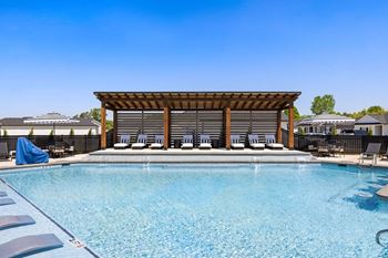 Swimming pool w/ multiple tanning decks