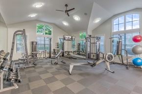 Charlotte apartment for rent - A spacious home gym with a variety of exercise equipment.