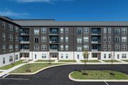 Rogers apartment for rent - an apartment building with a roundabout in front of it