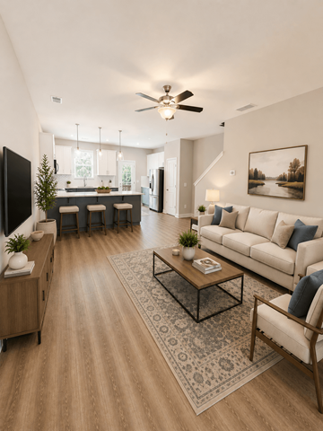 Mauldin townhouse for rent - A living room with a television, a couch, and a coffee table.