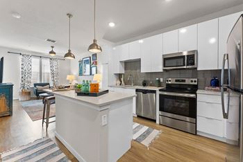 Stainless steel energy efficient appliance packages with microwave