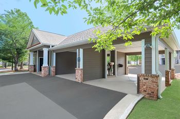 Car care center with vacuum and high pressure sprayer
