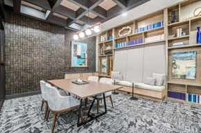 Madison apartment for rent - a room filled with furniture and a large window