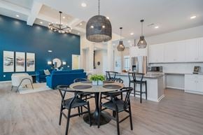 Middletown apartment for rent - A modern dining area with a table set for four.