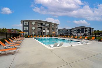 Sparkling swimming pool with sundeck