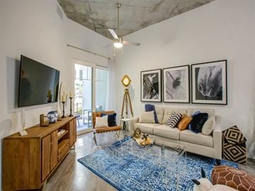 Tampa apartment for rent - a living room with a couch and a tv