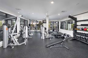 Decatur apartment for rent - 2-Bedroom Luxury Apartments in Decatur, GA - Reserve Decatur - Spacious Fitness Center With Strength Machines, Free Weights, Exercise Bench, and Bright Window Views.