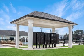 Chattanooga apartment for rent - a pavilion with a green lawn and a tennis court