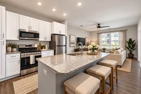Lebanon apartment for rent - A kitchen with a granite countertop and white cabinets.