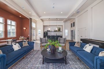 Lebanon apartment for rent - A living room with a dark brown coffee table and blue couches.