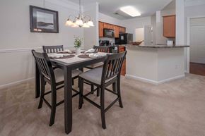 Columbus apartment for rent - A dining room with a table set for four.