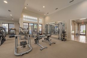 Cumming apartment for rent - A spacious gym with a variety of equipment.