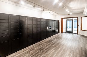 Memphis apartment for rent - a row of black lockers in a white room with a door