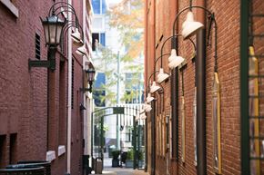 Memphis apartment for rent - a city street with red brick buildings and street lights
