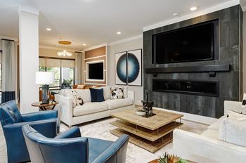 Luxurious clubroom with flat screen tv’s and gaming area perfect for entertaining guests at your next event
