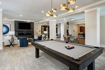 Luxurious clubroom with flat screen tv’s and gaming area perfect for entertaining guests at your next event