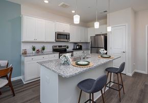 Columbia apartment for rent - a kitchen with an island and two stools