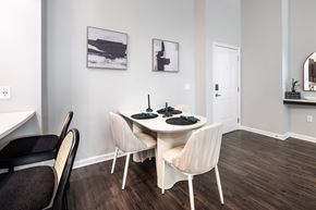 Mount Pleasant apartment for rent - A dining room with a white table and chairs.