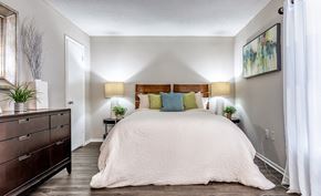 Sarasota apartment for rent - A bedroom with a large bed and a wooden dresser L'Estancia, Sarasota, FL, 34231